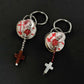 Handcrafted earrings with buttons and cross elements made of natural seashell