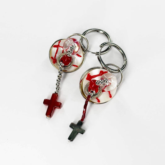 Handcrafted earrings with buttons and cross elements made of natural seashell