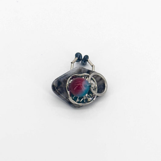 Irregularly shaped handmade ring made of resin, natural stone