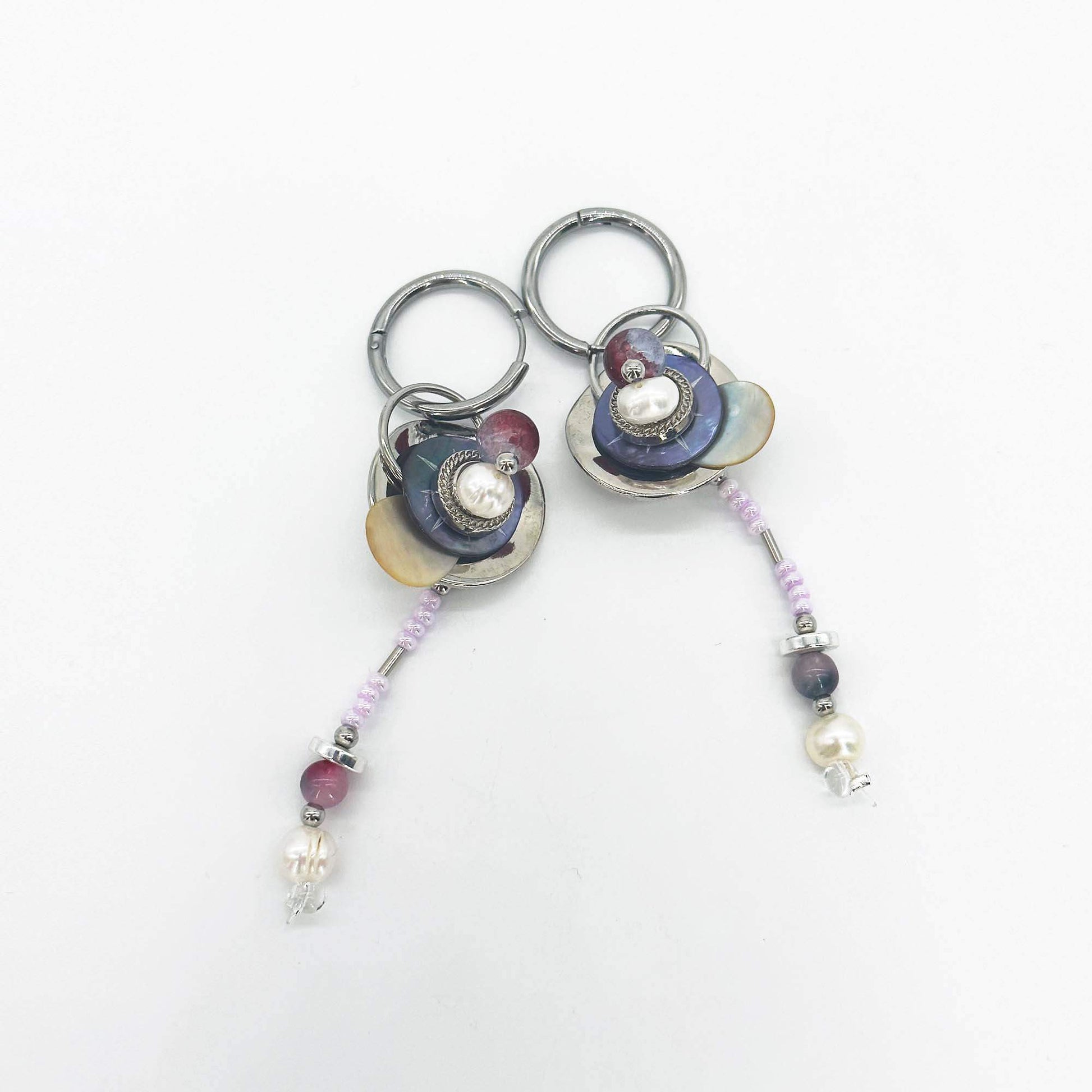 Handmade earrings made of freshwater pearl, natural seashel