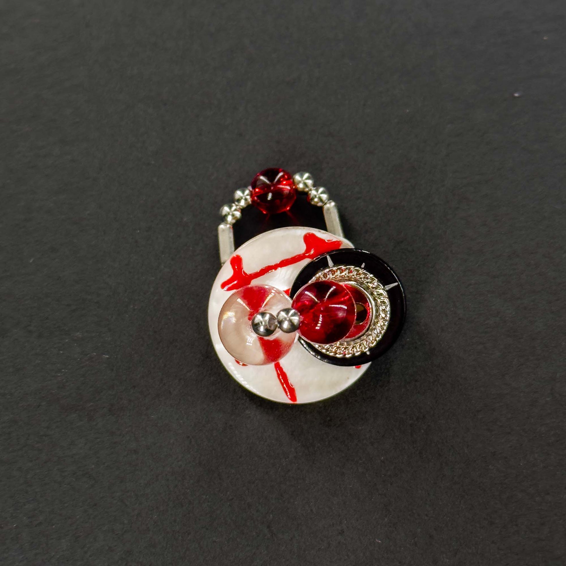 Handmade ring made of seashell, colored glaze