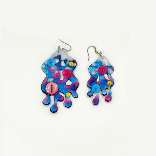 Irregular colored handmade earrings with eye elements made of resin